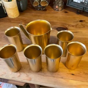 Vintage metal cups and pitcher.
